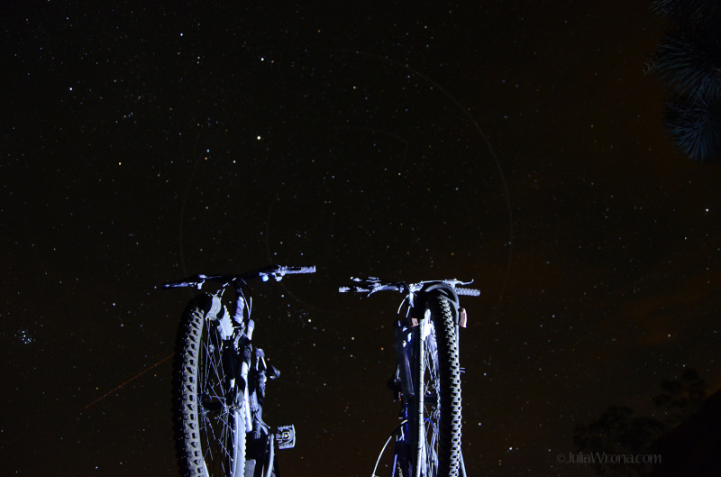 Bikes lit up in the night sky